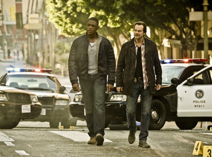 TRAINING DAY is a crime thriller that begins 15 years after the events of the feature film, about a young, idealistic police officer (Justin Cornell, left) who is tapped to go undercover in an elite squad of the LAPD where he partners with a veteran, morally ambiguous detective (Bill Paxton). Photo: Michael Yarish/CBS ©2016 CBS Broadcasting, Inc. All Rights Reserved